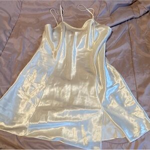 White silk slip dress with slit in the side